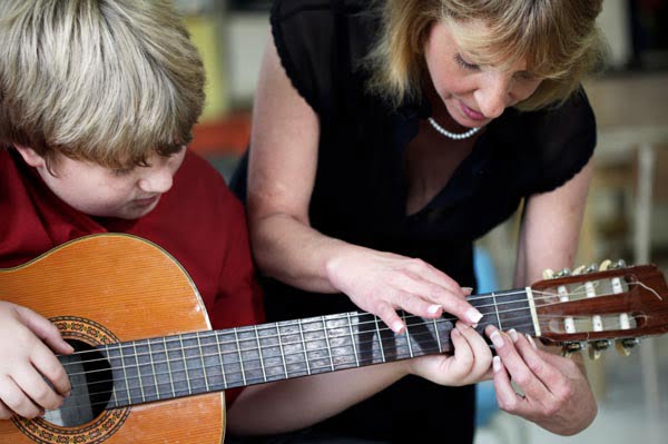 child-taking-music-lessons.jpg