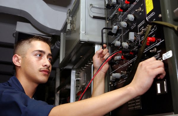 US_Navy_020902-N-4953E-005_Aviation_Electrician_conducts_a_temperature_controller_test_set_for_a_cabin_sensor_aboard_USS_Harry_S._Truman_CVN_75.jpg